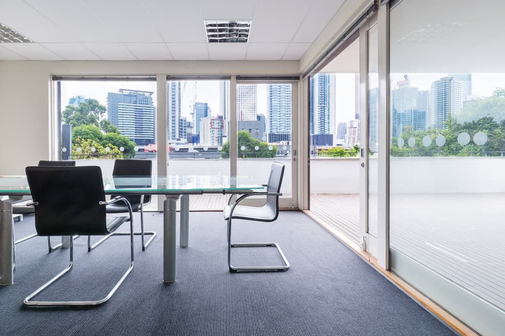 A Conference Room with A Glass Table — More on the Floor in Barrack Heights, NSW