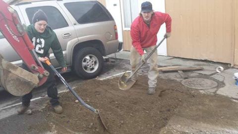 Packing the dirt back in in Rathdrum, ID at Little Stinker Septic