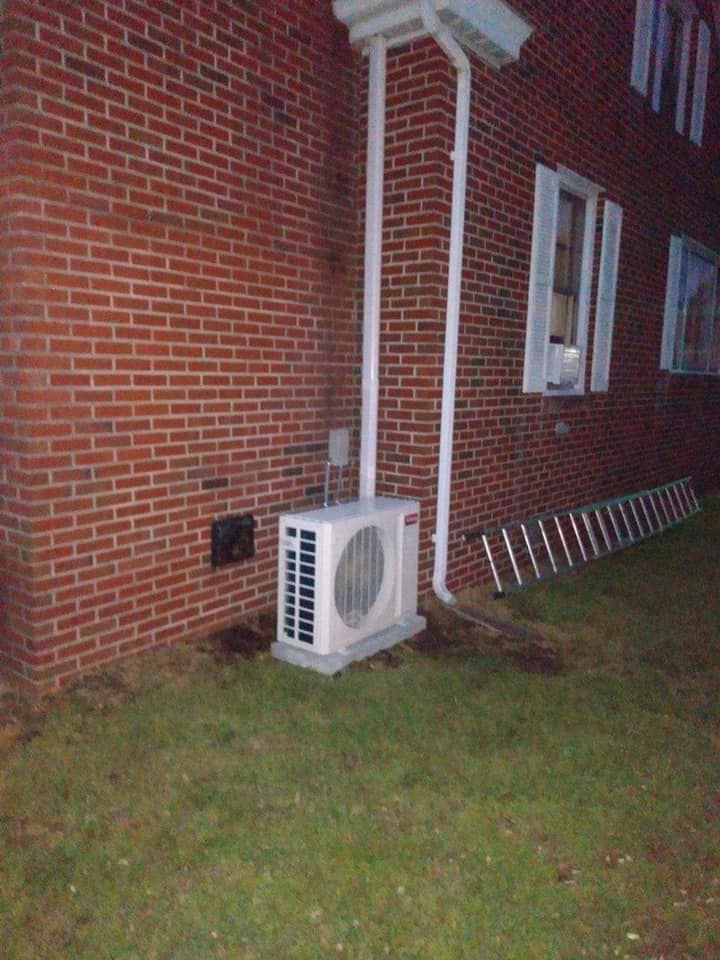 AC Unit Outside House Near Wall - Chesapeake, VA - Southside Energy