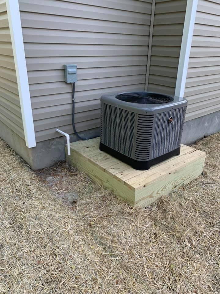 AC Unit Outside House Elevated From Ground - Chesapeake, VA - Southside Energy