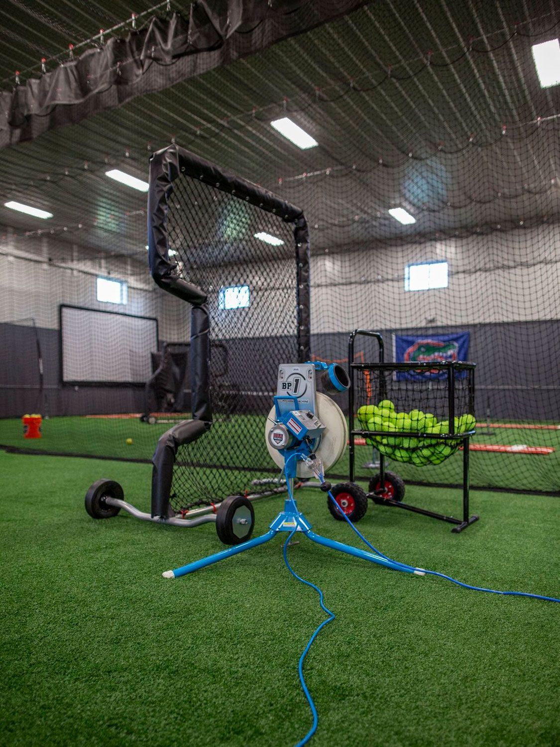 A pitching machine at Home Turf.