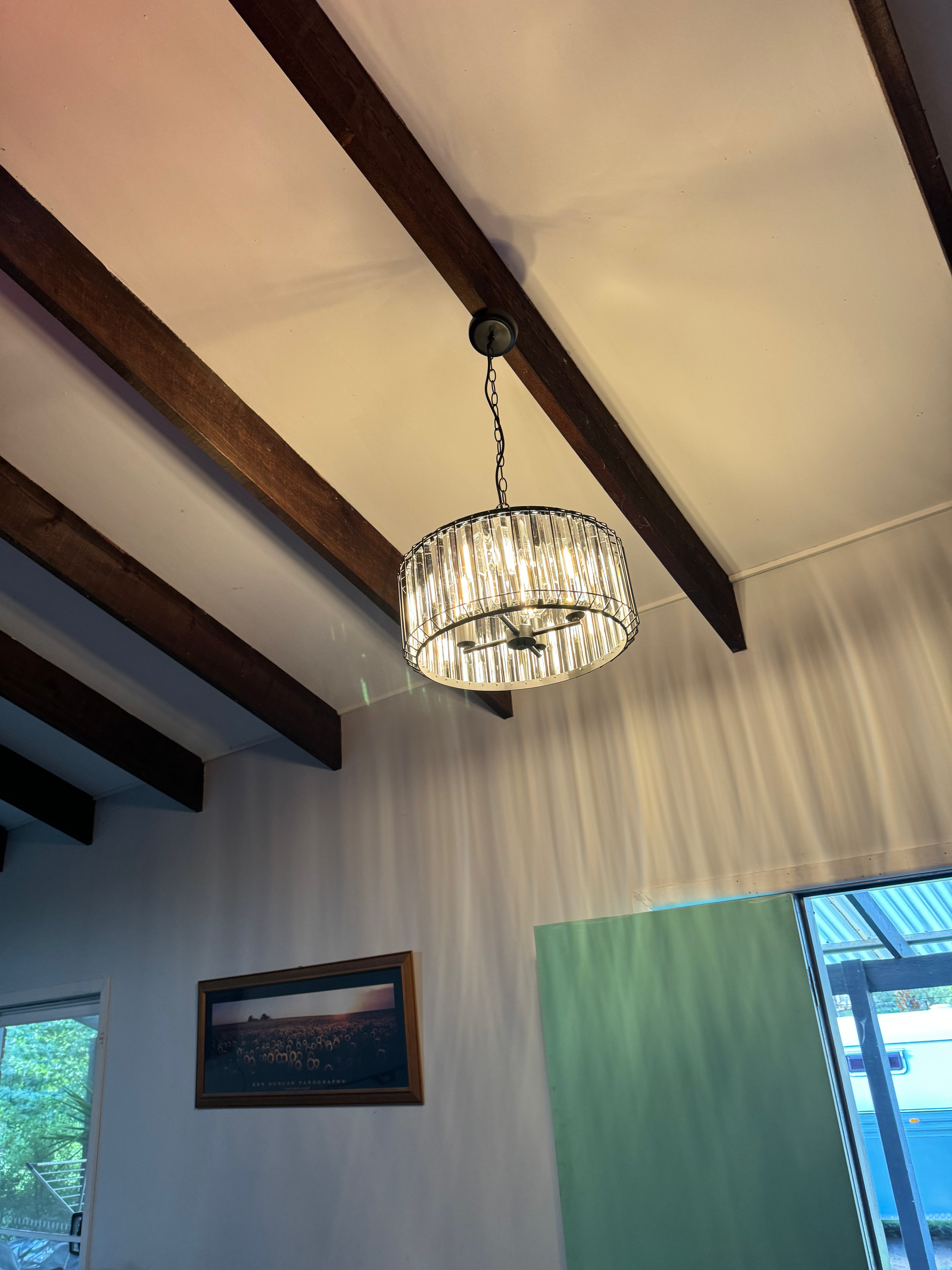 A Hanging Light Is Hanging From The Ceiling — Rid-Arc Electrical In Tamworth, NSW