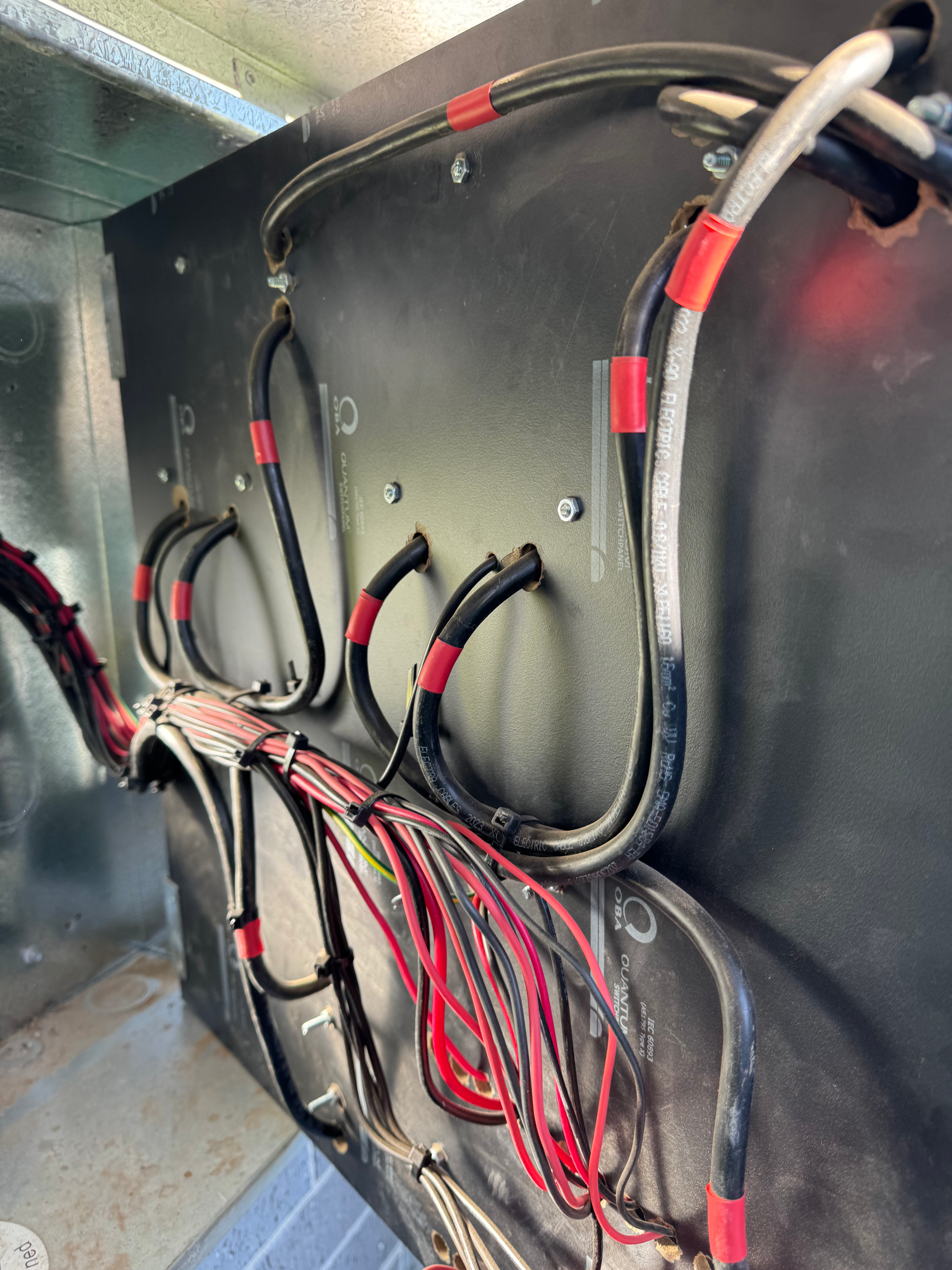 Black And Red Wires Are Attached To The Wall — Rid-Arc Electrical In Tamworth, NSW