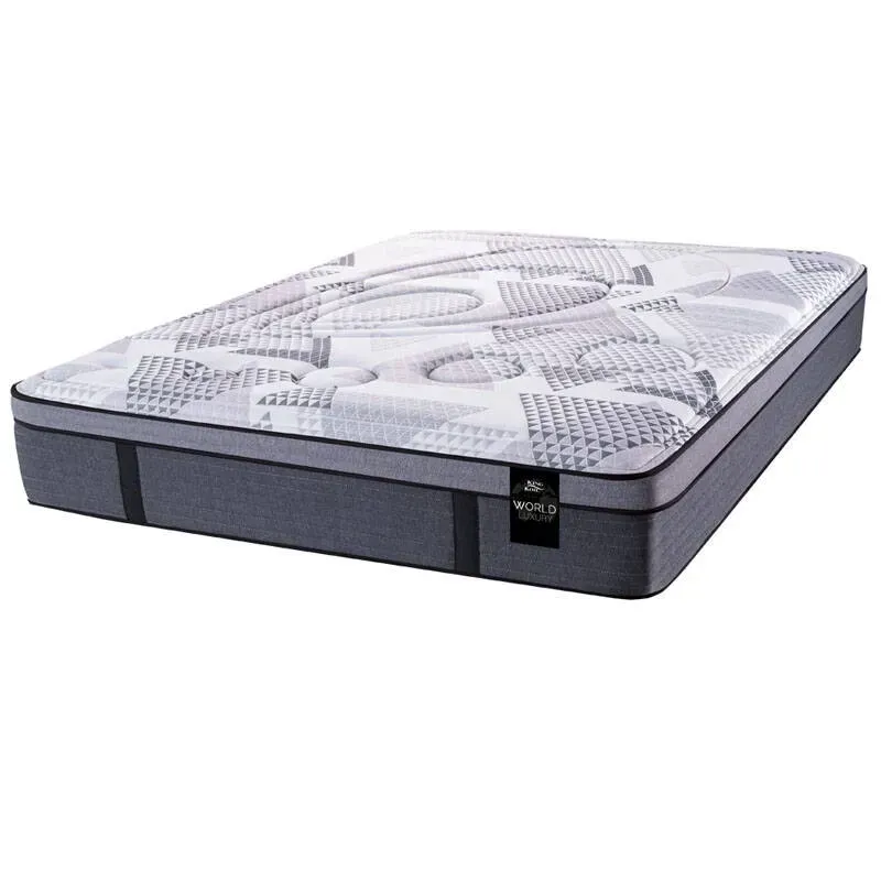 Colchón con estampado gris y blanco y borde gris oscuro.