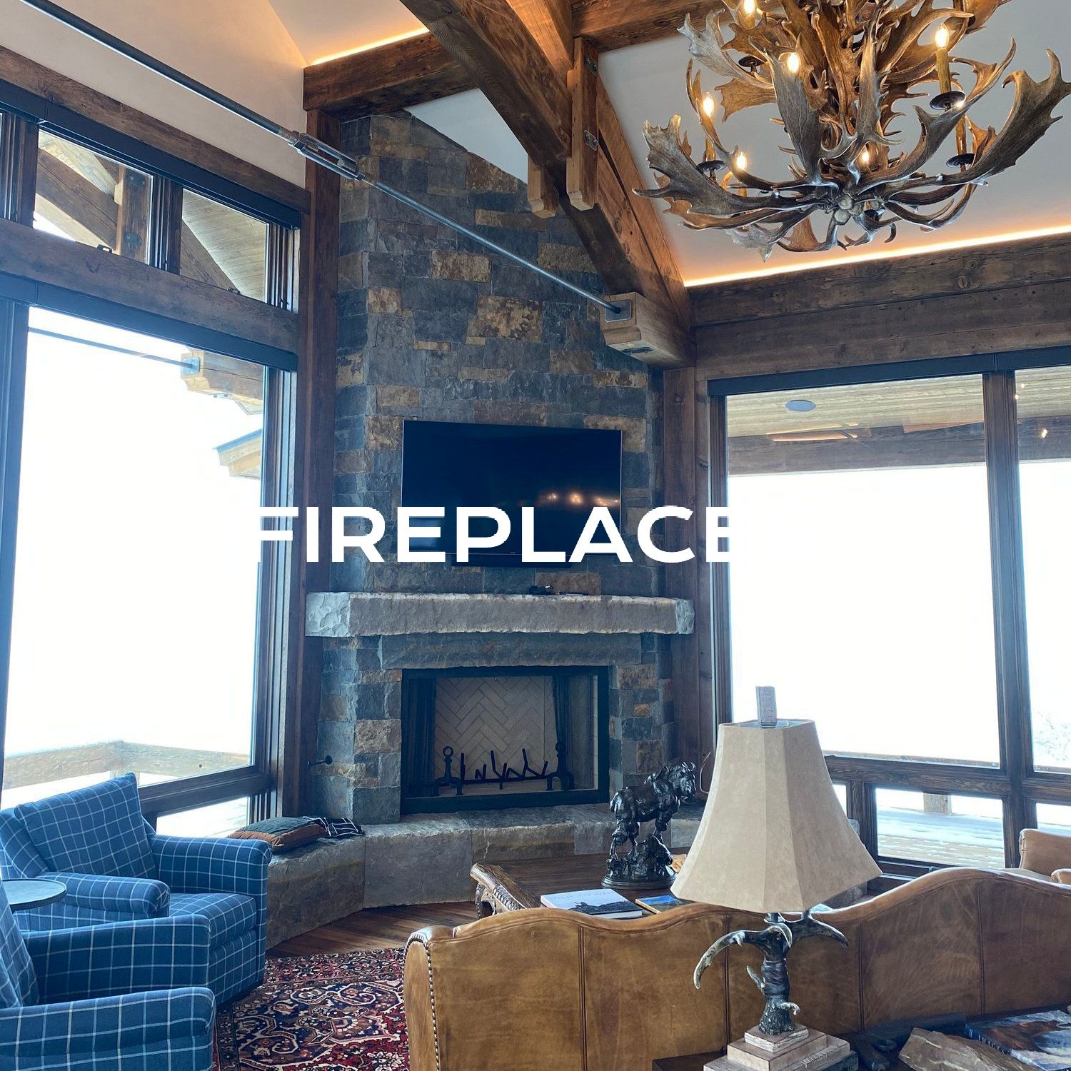 a living room with a fireplace and a television .