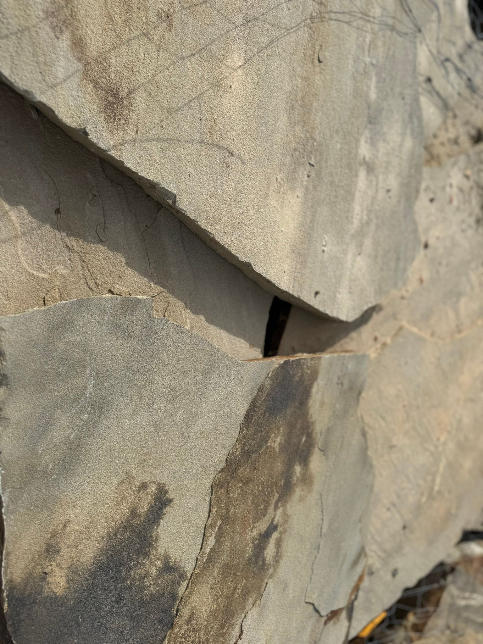 A close up of a rock with a hole in it.