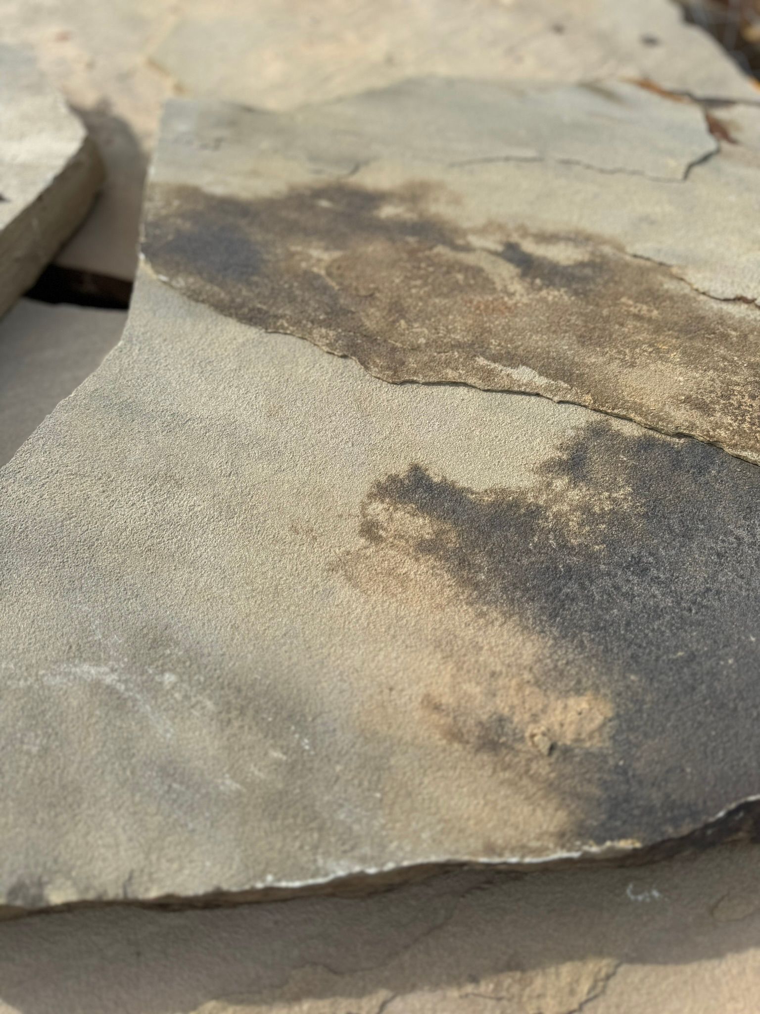 A close up of a piece of rock on a table.