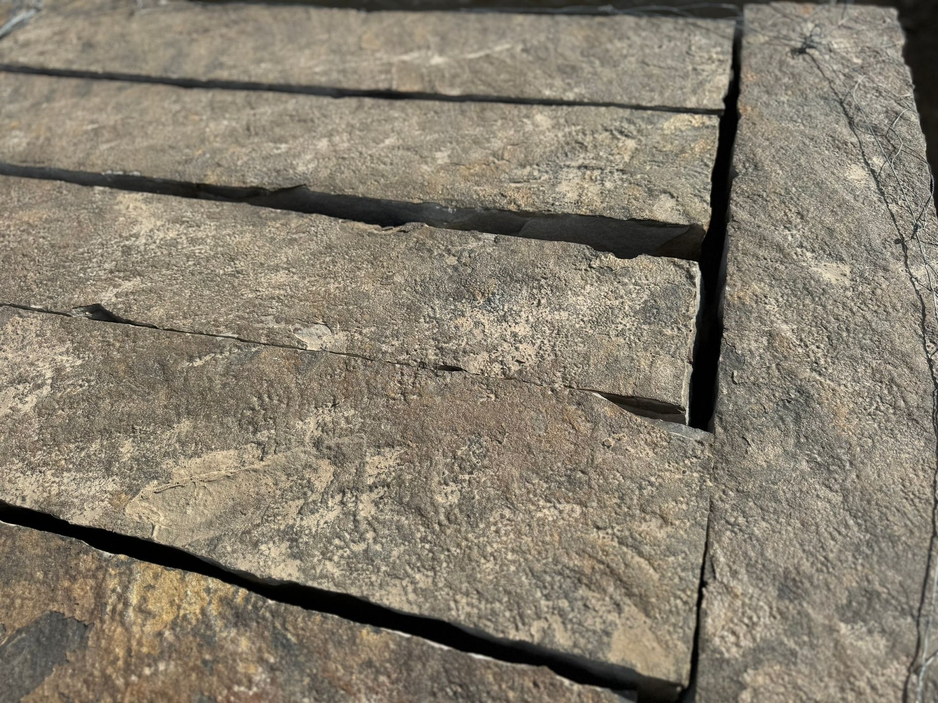 A close up of a piece of wood with a hole in it.