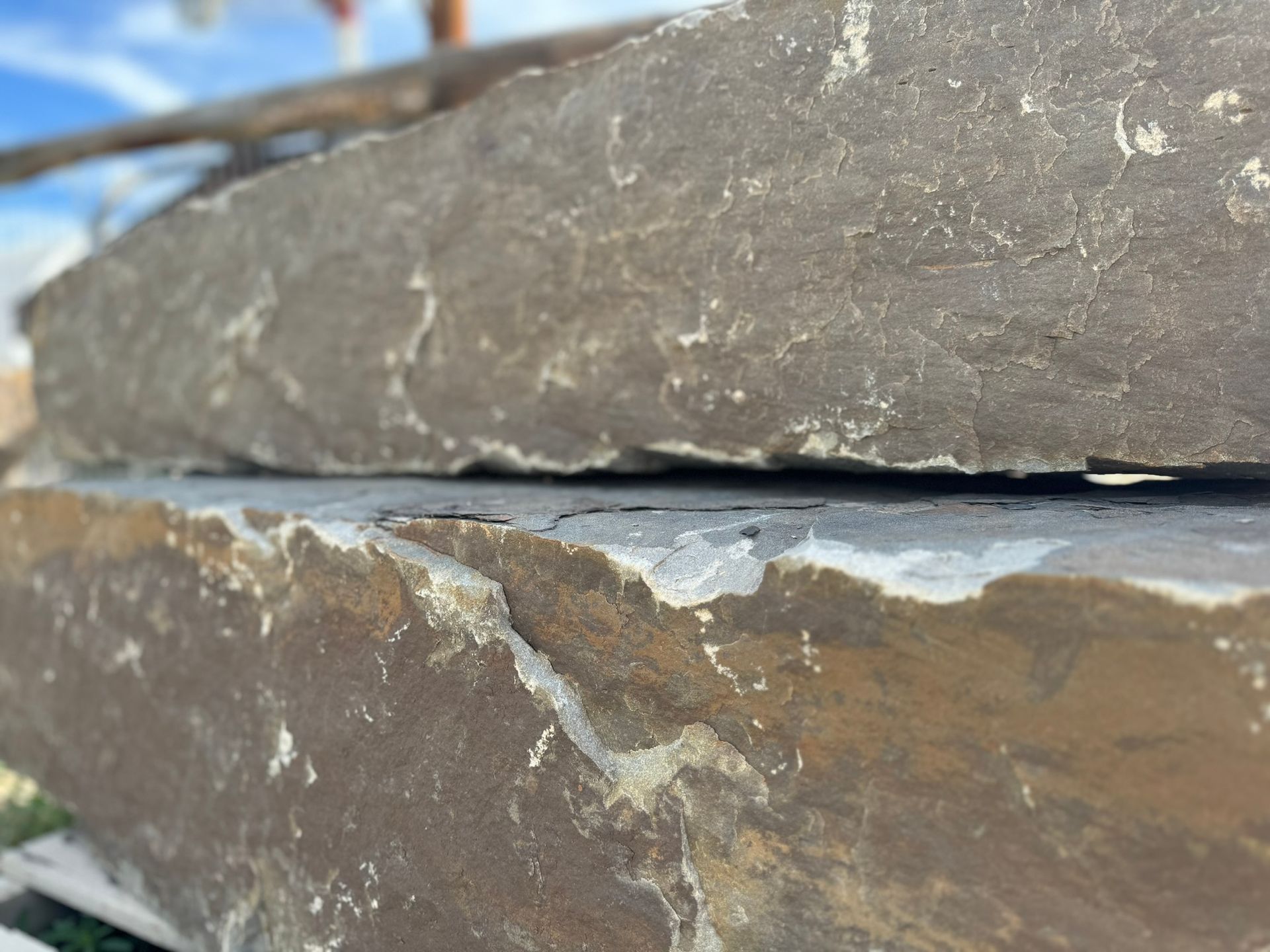 A close up of a pile of rocks sitting on top of each other.