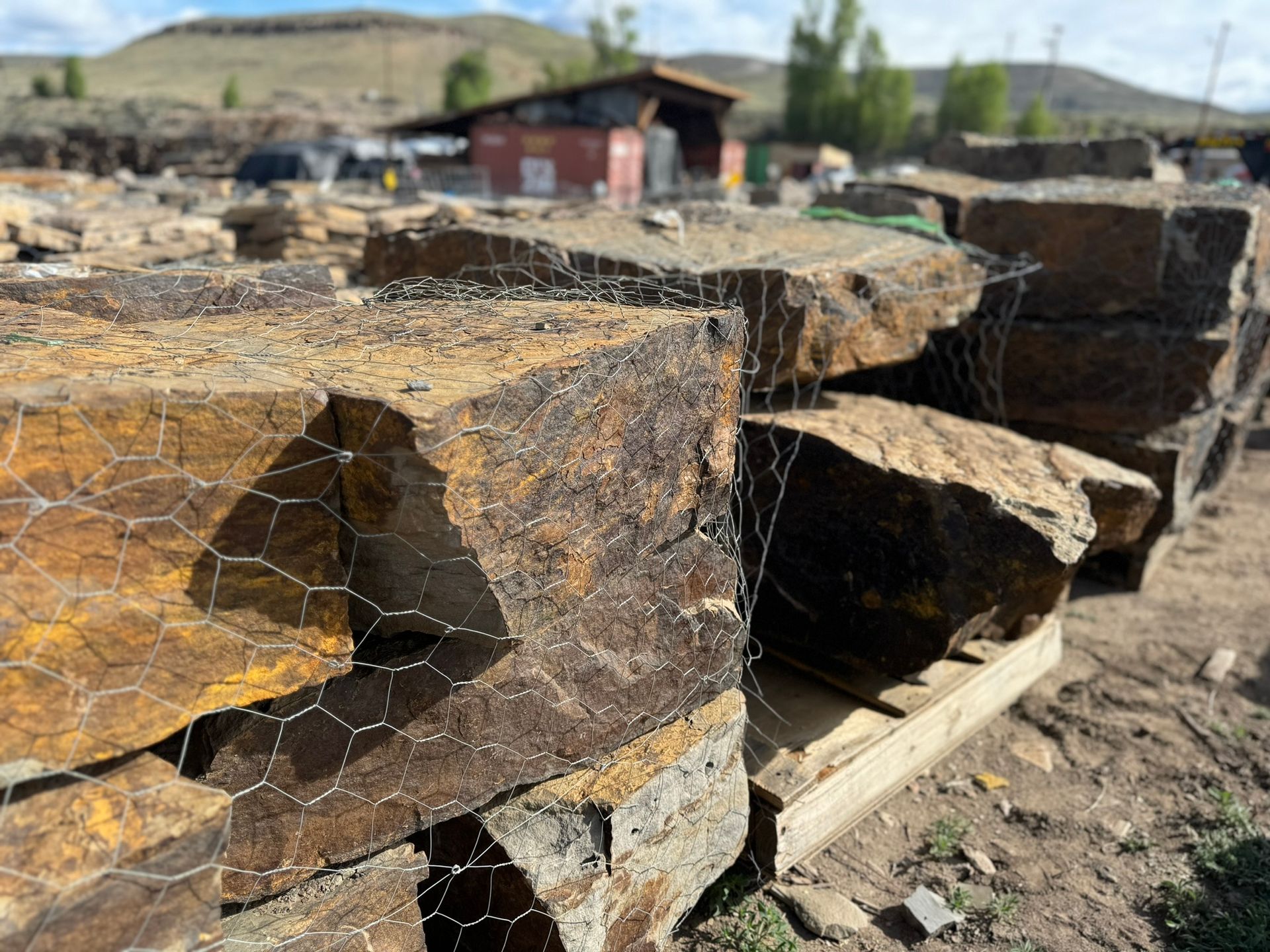 A pile of rocks sitting on top of a wooden pallet.