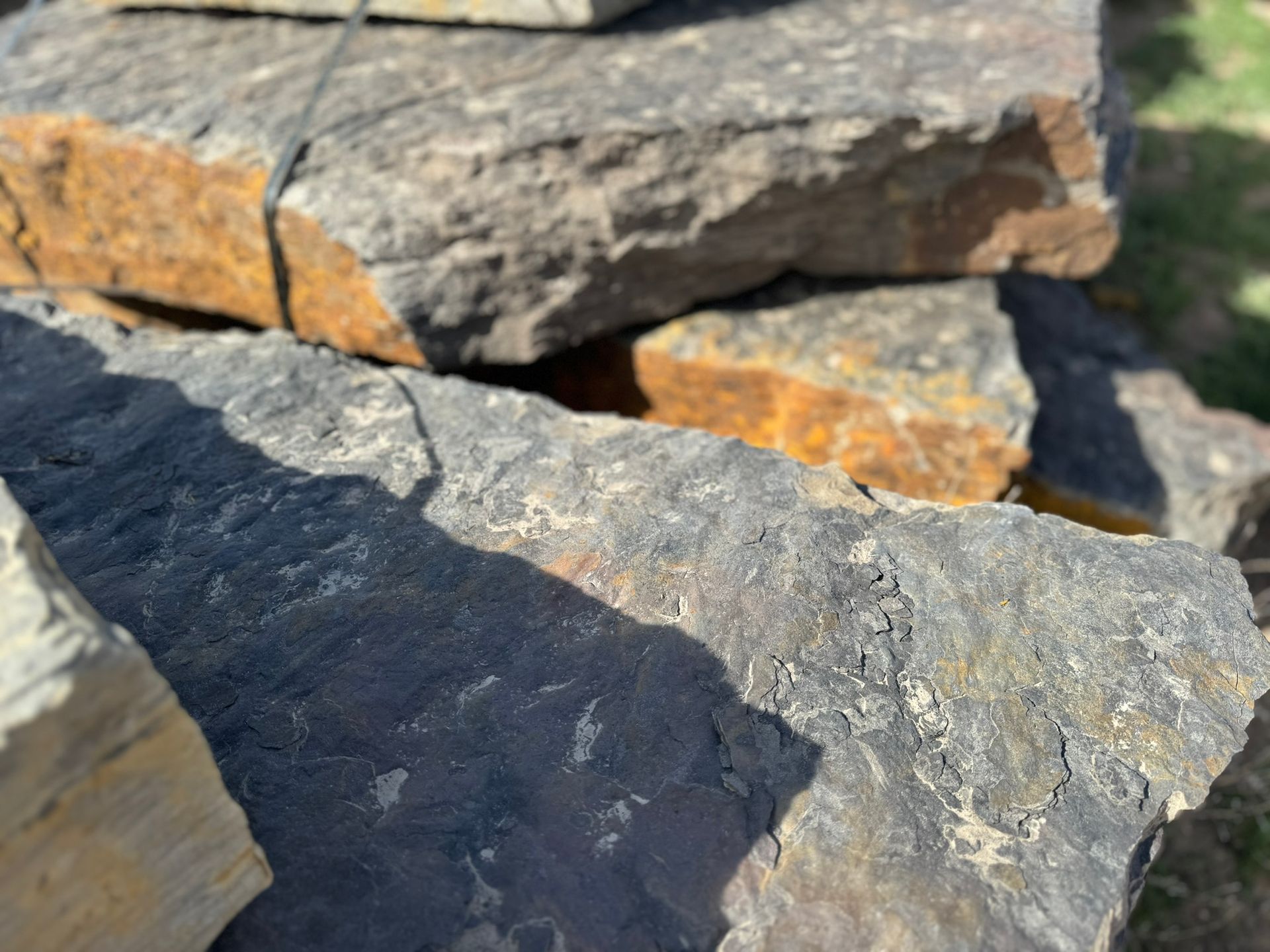 A close up of a pile of rocks sitting on top of each other.