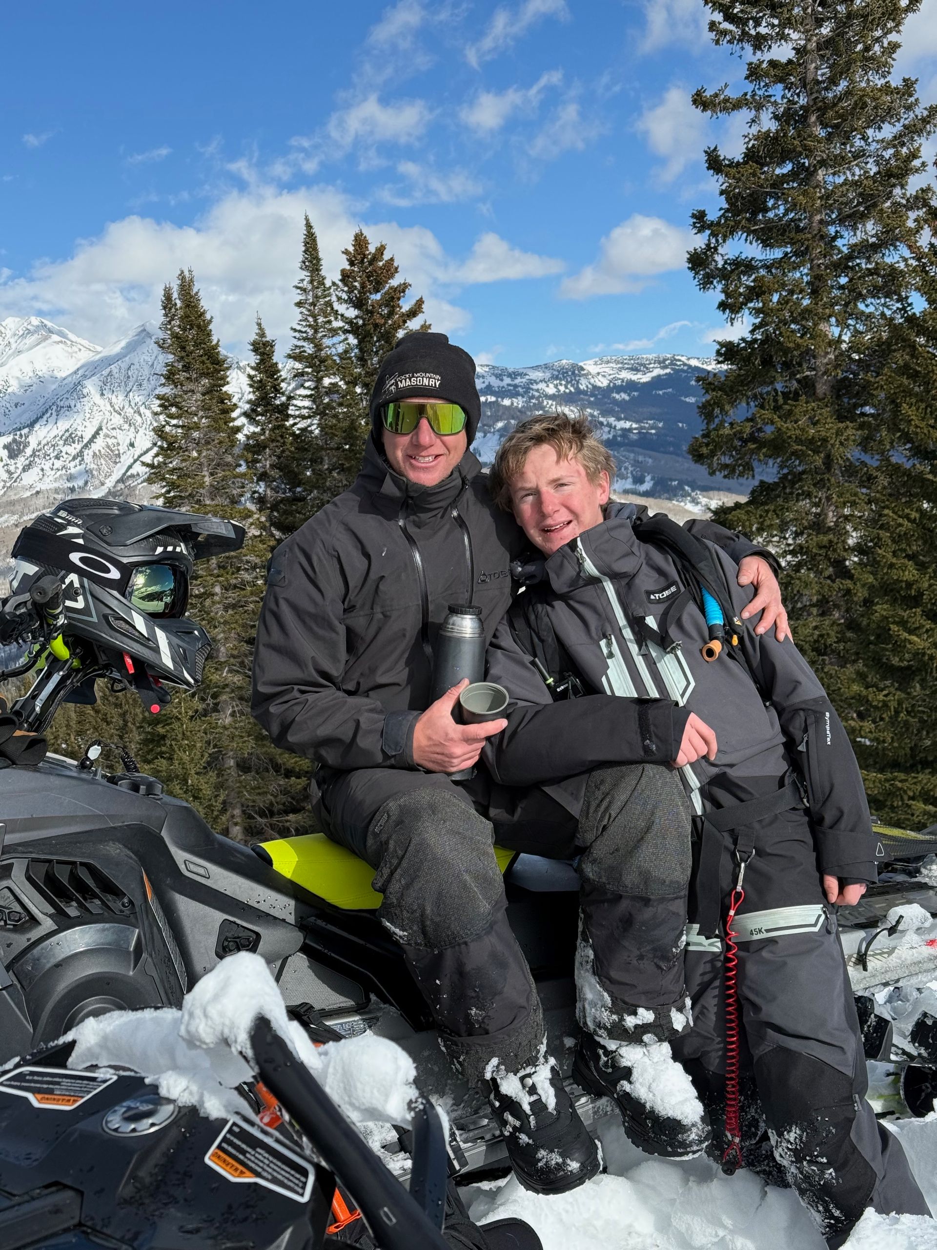 a man is riding a bike down a hill with the name kain leonard on the bottom