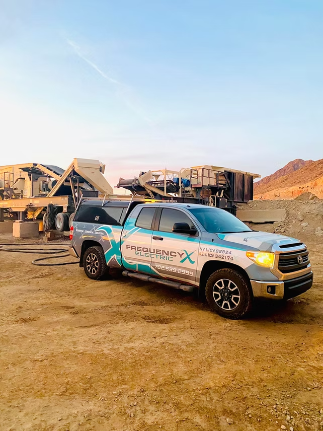 Toyota truck with turquoise wrap branding 