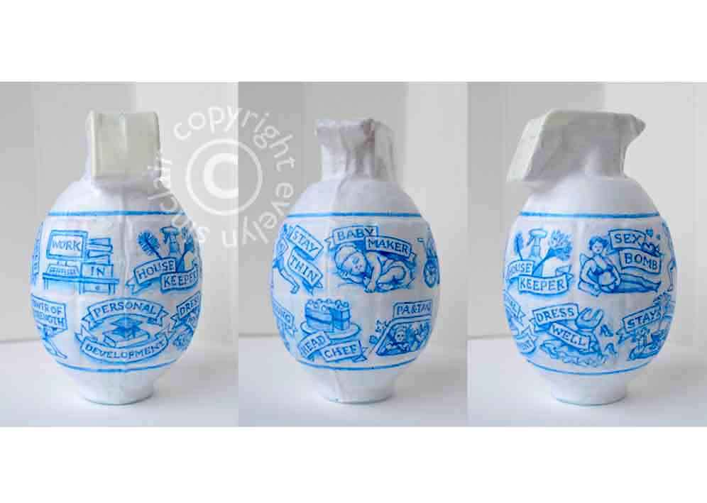A hand-painted grenade artwork, covered in images of the pressures society puts on womankind, by artist Evelyn Sinclair, based in Kendal, Cumbria in the Lake District.