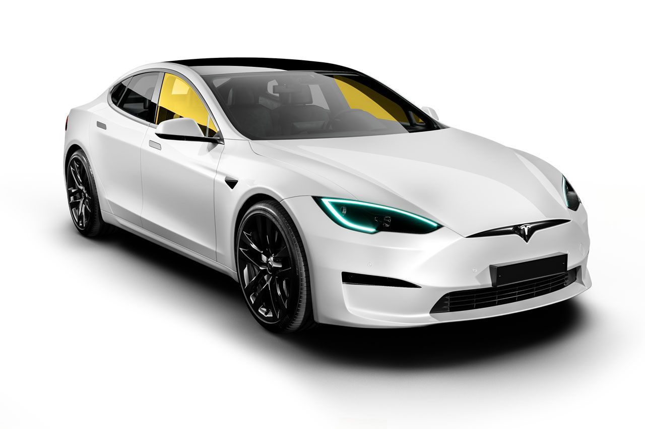 A white tesla model s is shown on a white background.