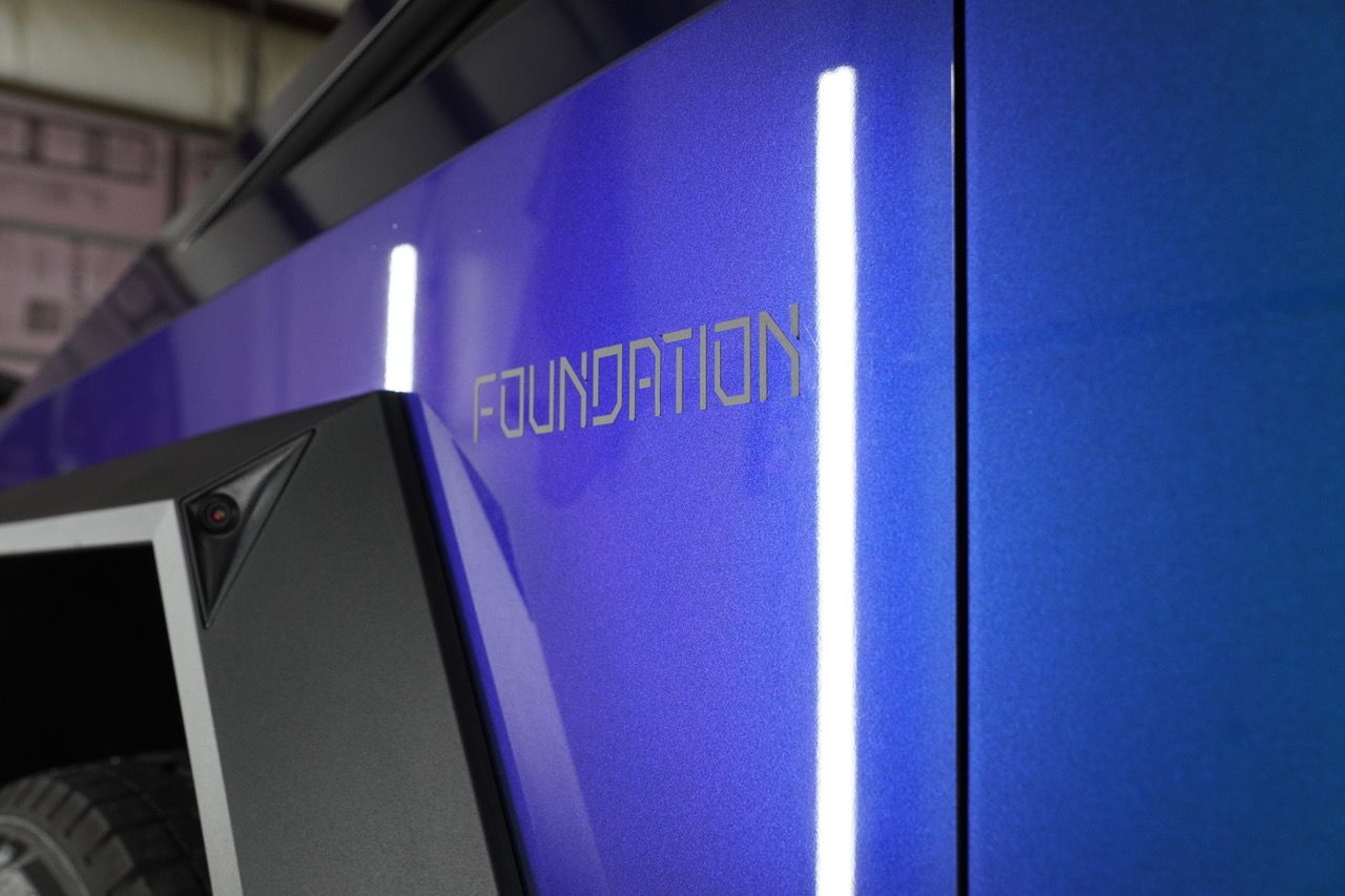 A blue wall with the word foundation on it