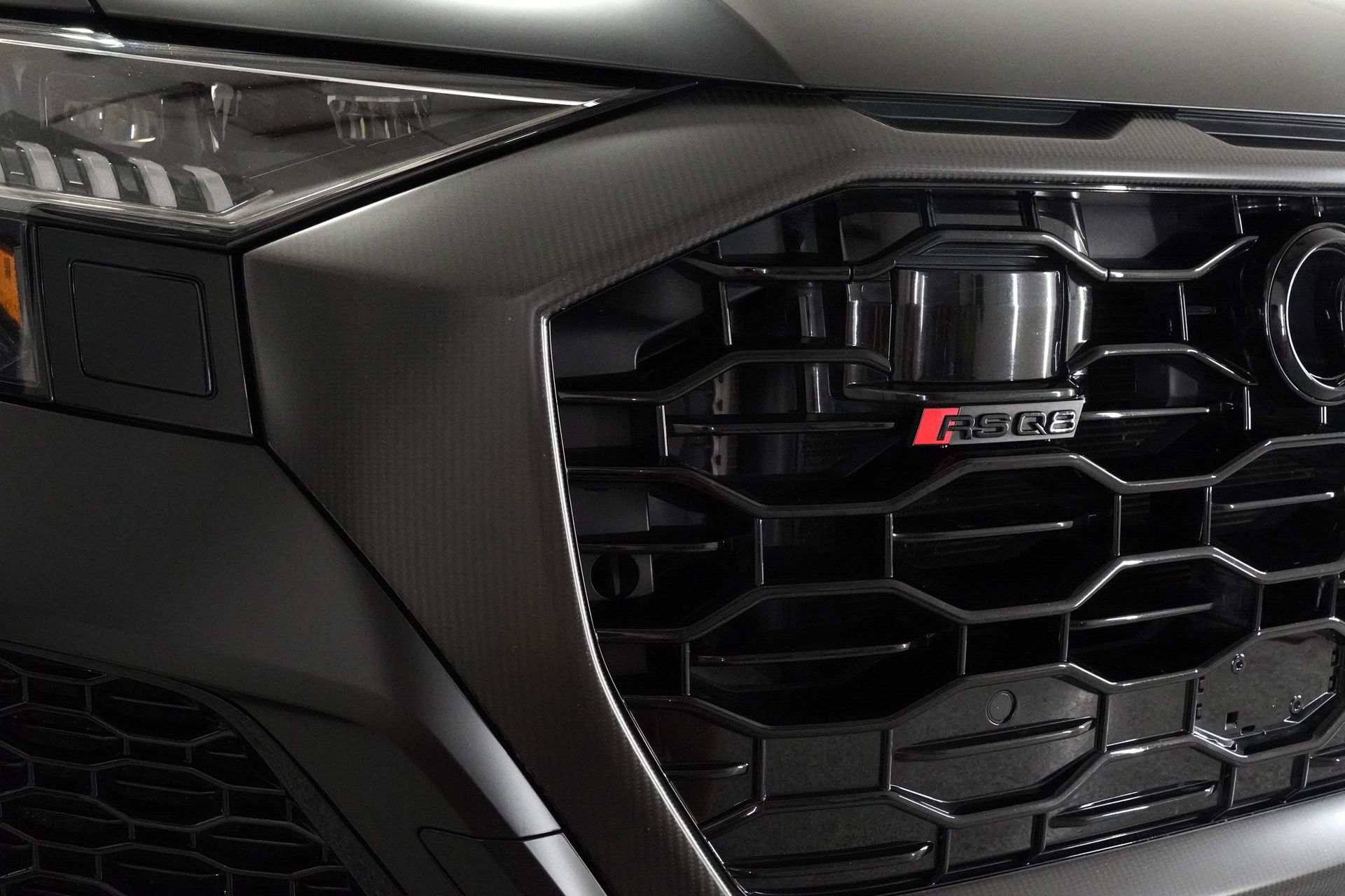 A close up of the front grille of a car.