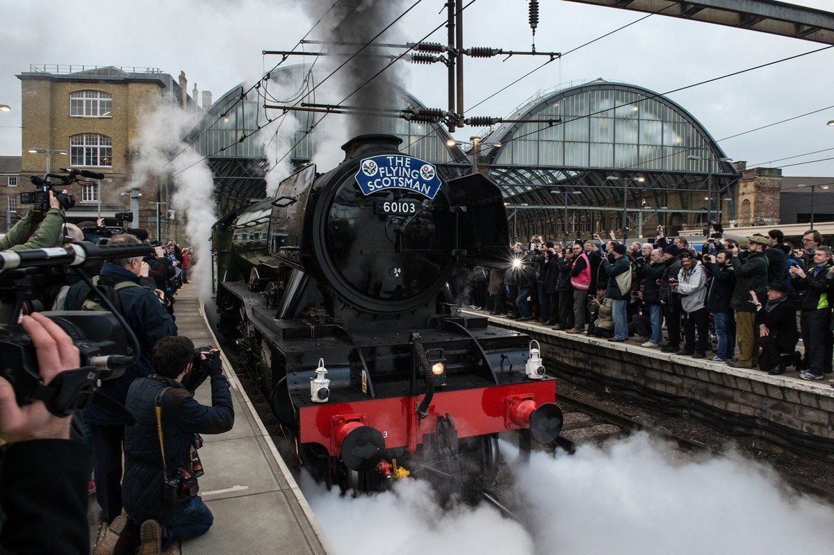 Flying Scotsman in steam leaving London Kings Cross on the inaugural run to York