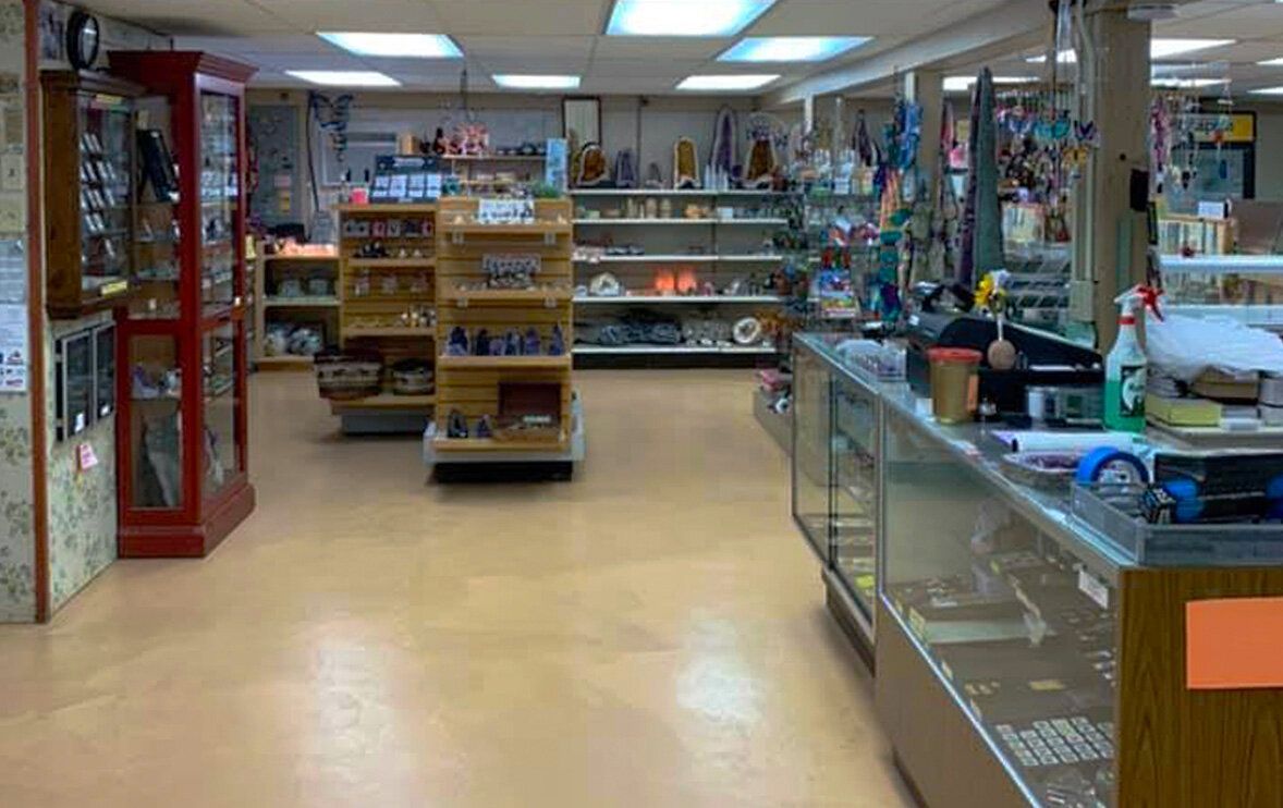 A store filled with lots of shelves and display cases.
