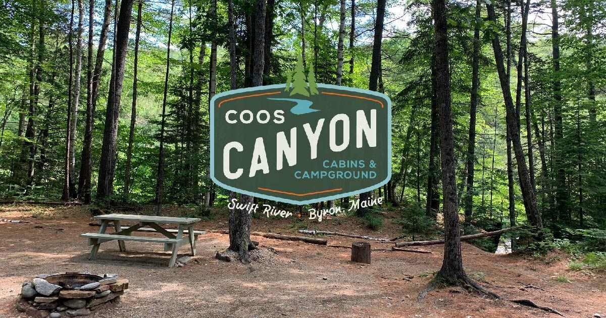 Coos Canyon Campground office with porch in the middle of a forest