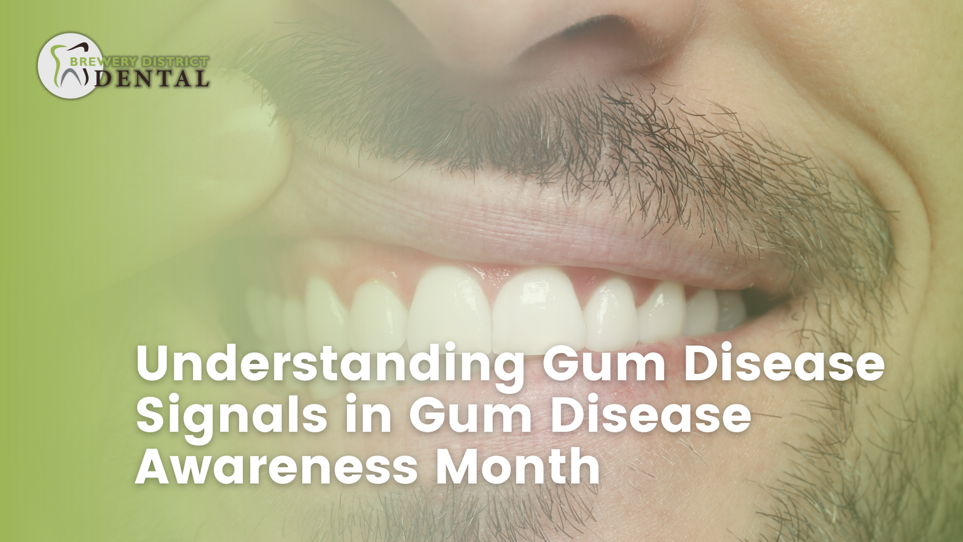 a man with a beard is smiling for gum disease awareness month .