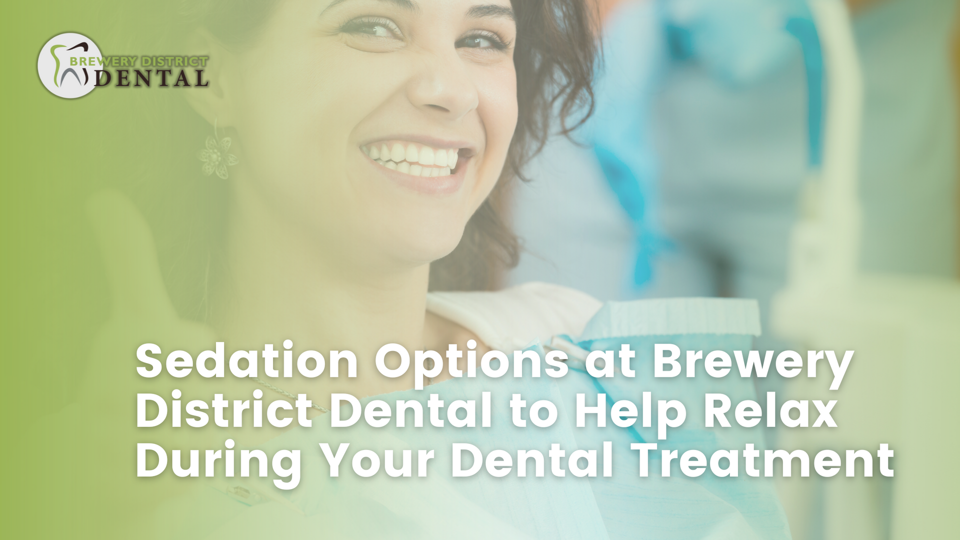 woman smiling at dentist office with brewery district dental logo