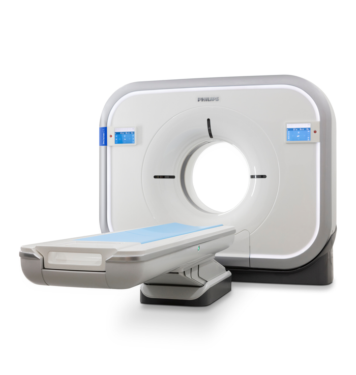 A CT Scanner stands alone with a white background