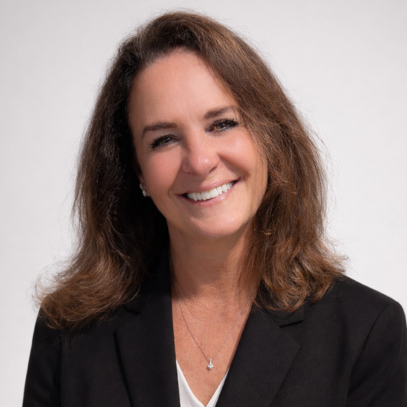 a man wearing a collard shirt and jacket