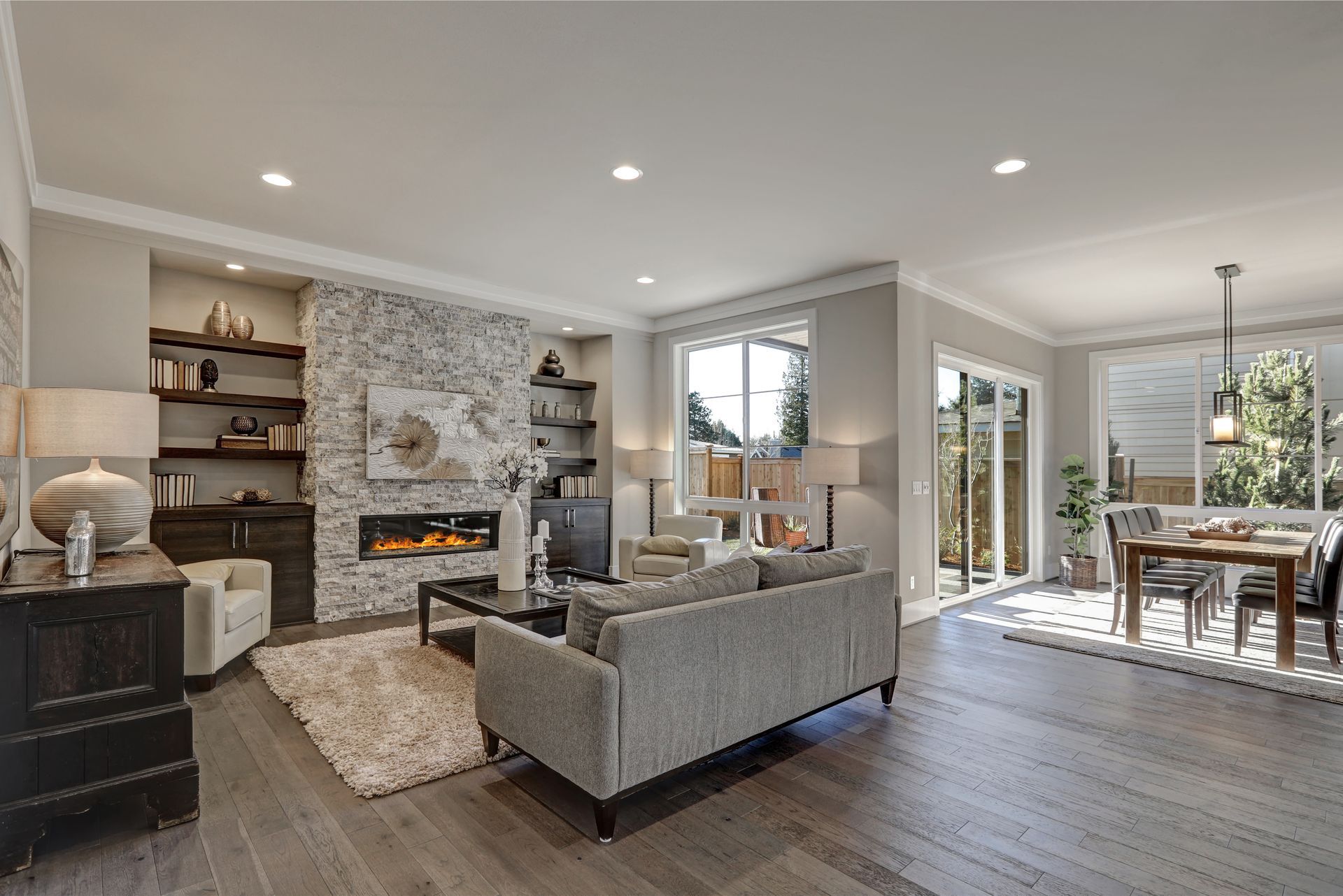 Stock photo of a living room that seamlessly transitions to the dining room