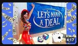 Screenshot of a video of Carla with a sign that says 