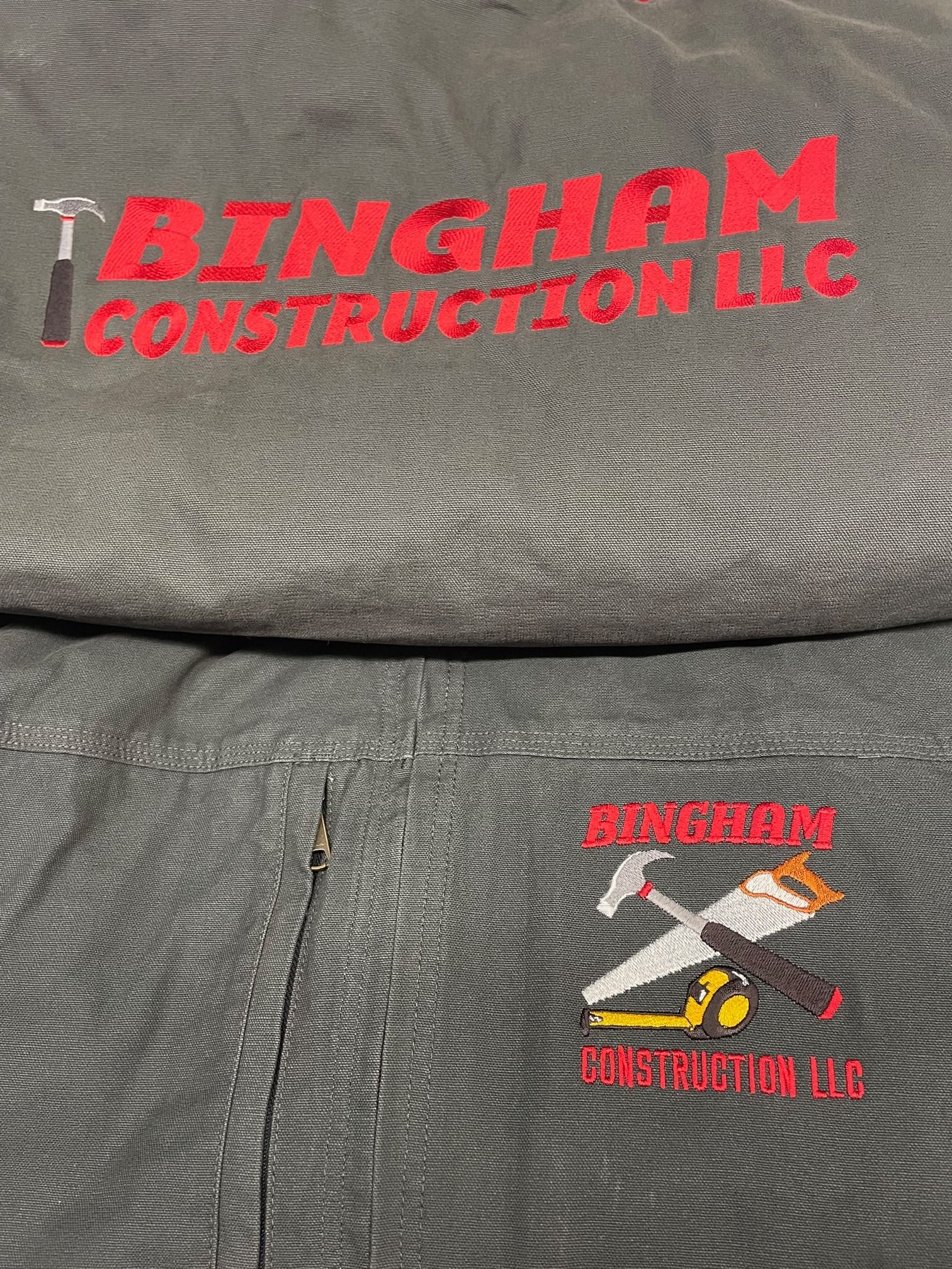 A t-shirt that says bingham construction llc on it