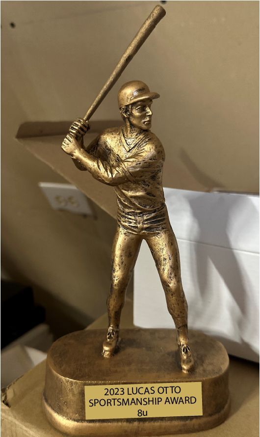 A statue of lucas otto holding a baseball bat