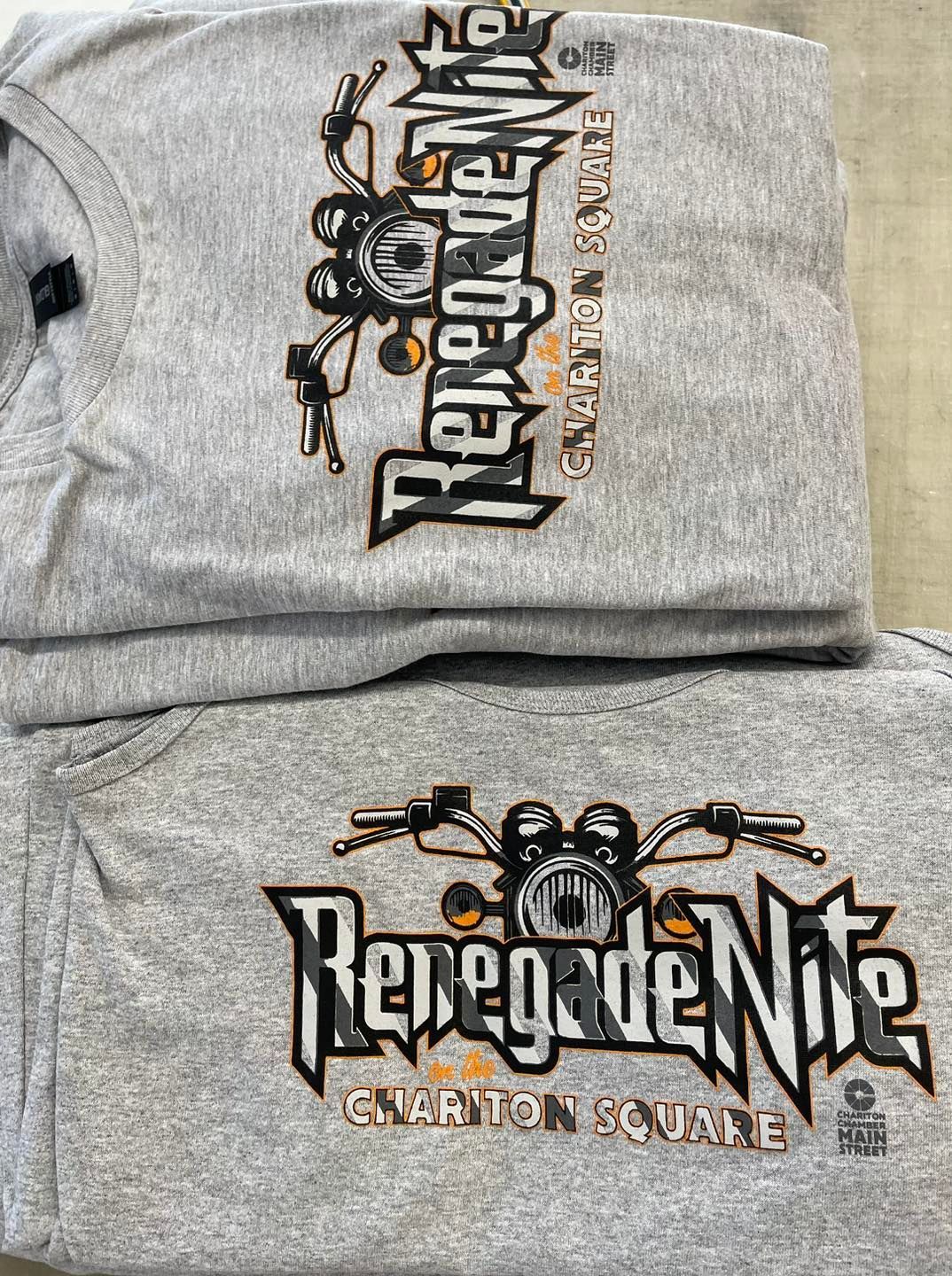 Two t-shirts are stacked on top of each other with the word renegade on them.