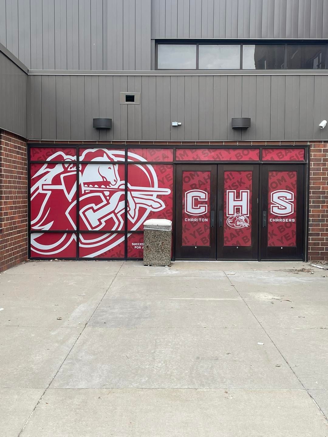 A building with a sign that says chs on it