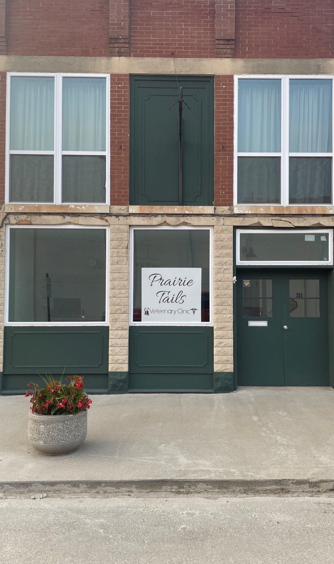 A building with a sign that says prairie folk