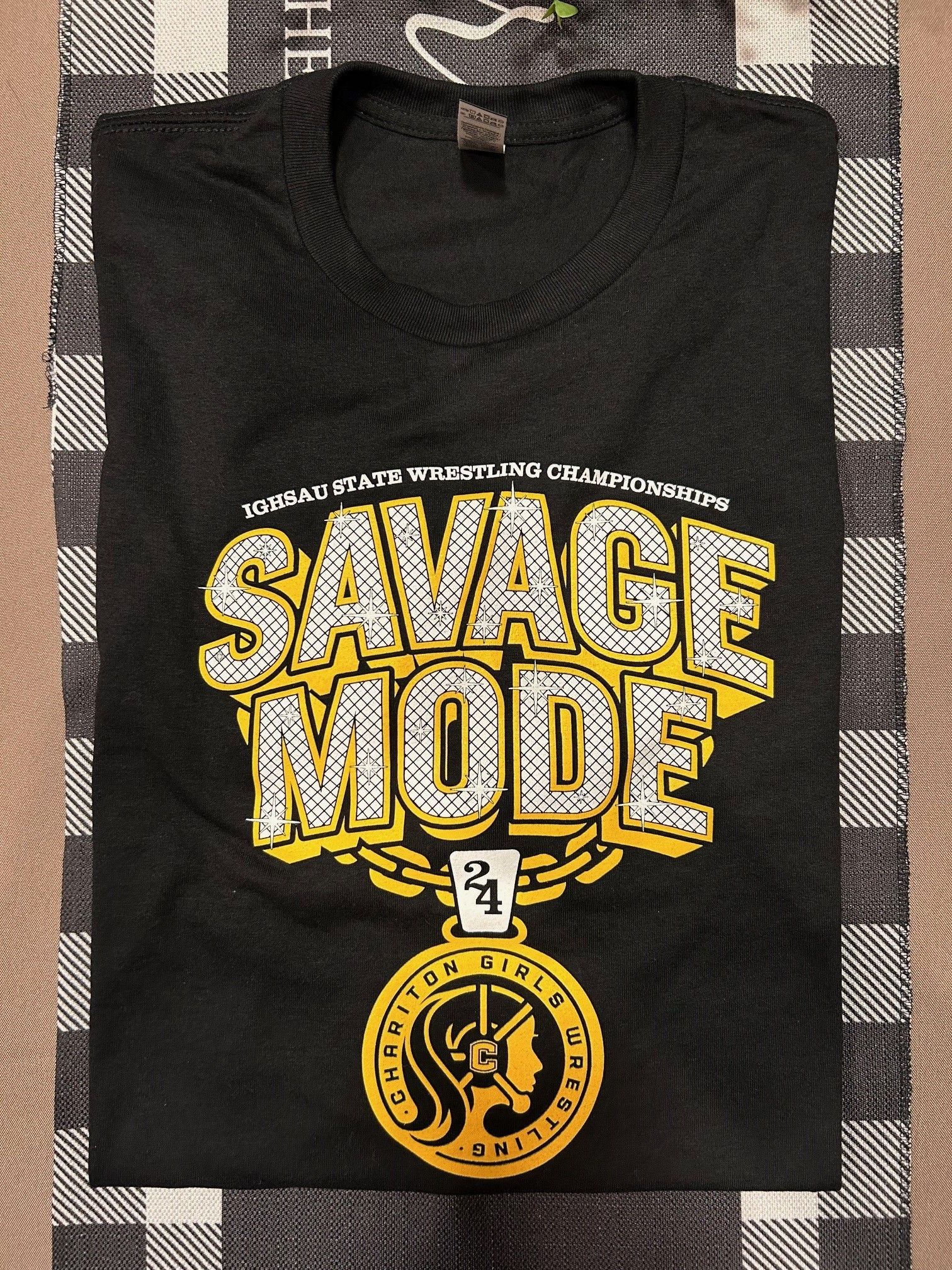 A black t-shirt with the words savage mode on it