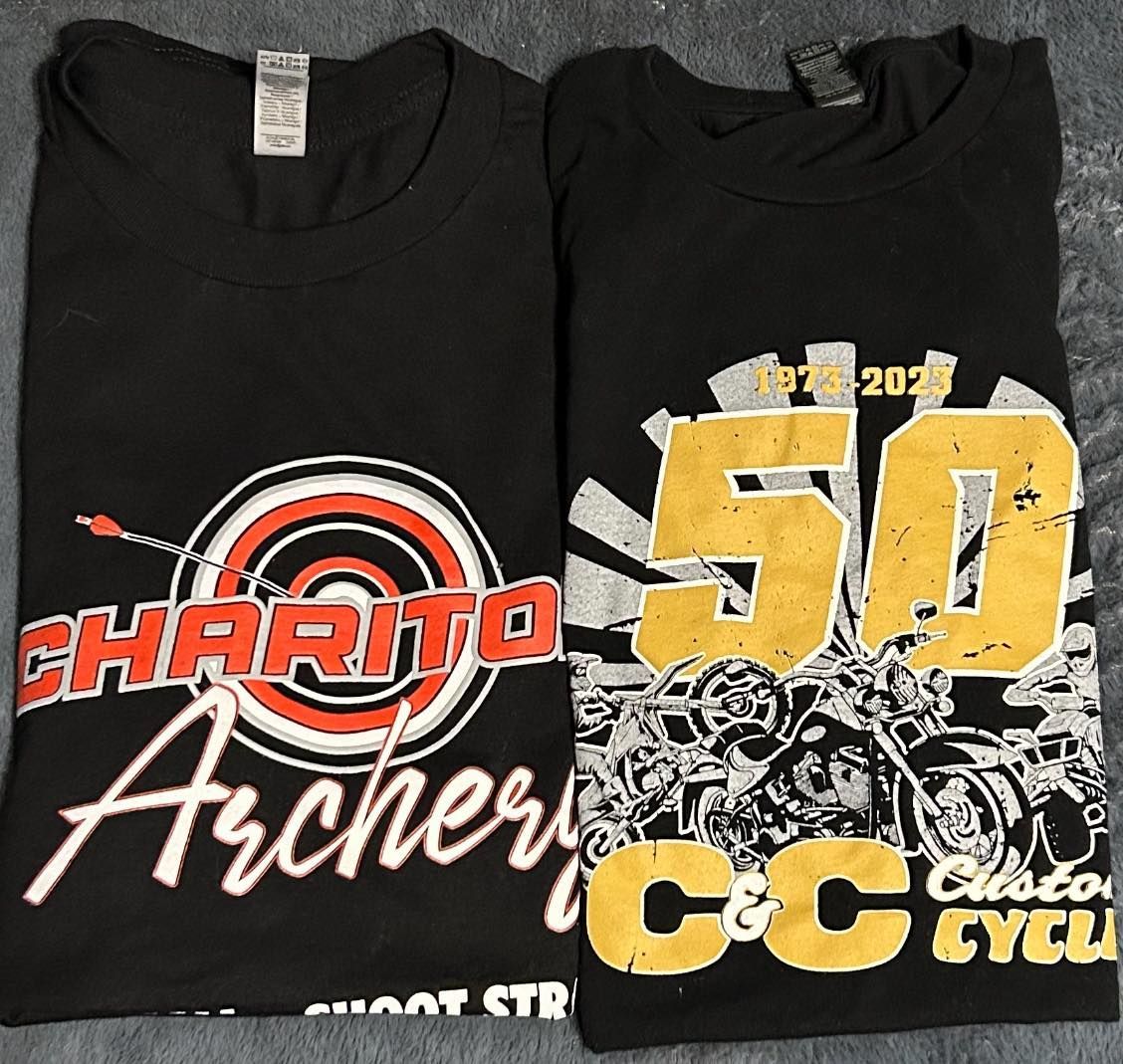 Two black shirts with archery and 50 on them