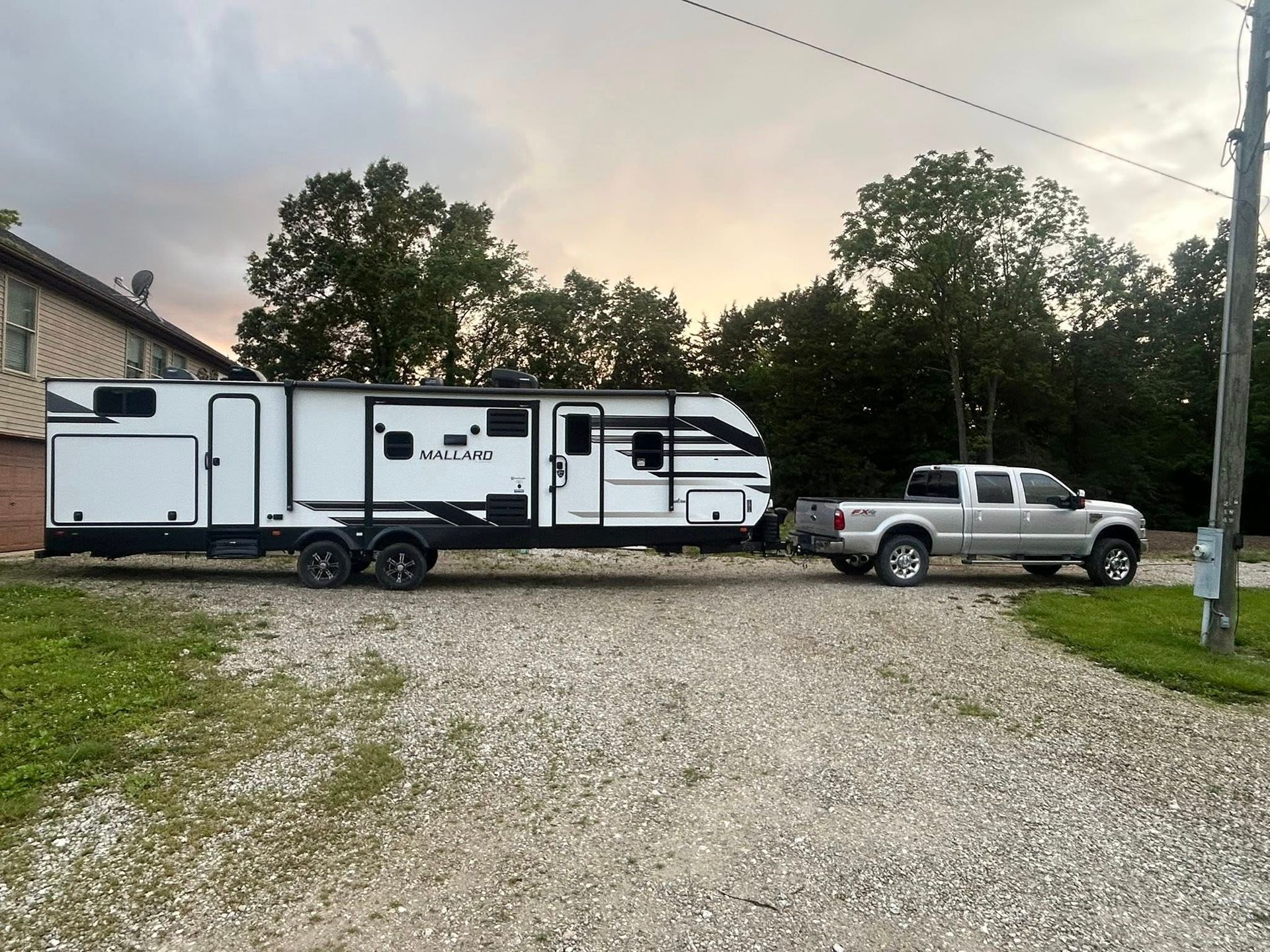 a used 2023 Heartland Mallard M33 travel trailer