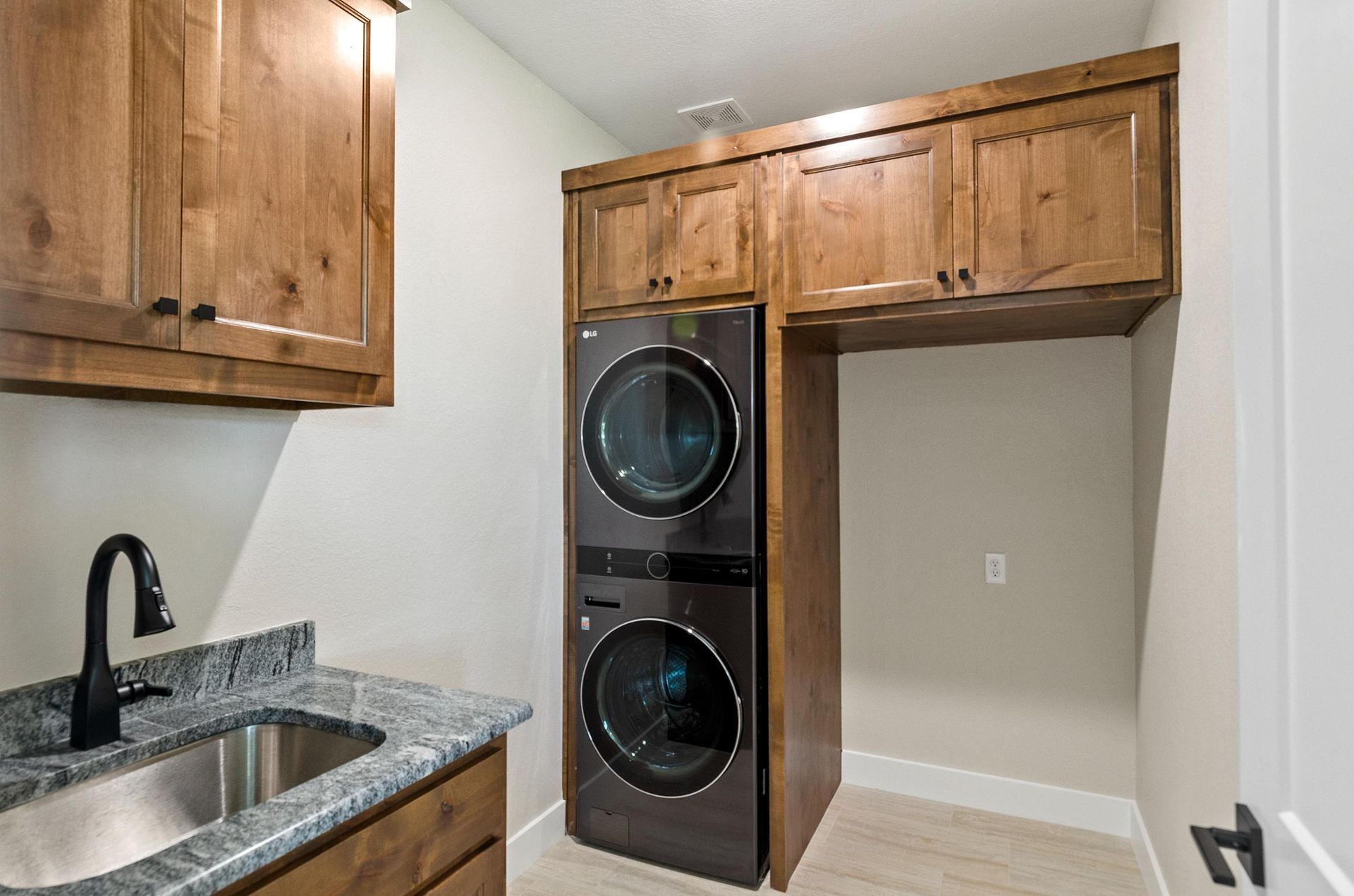 A laundry room with a washer and dryer.