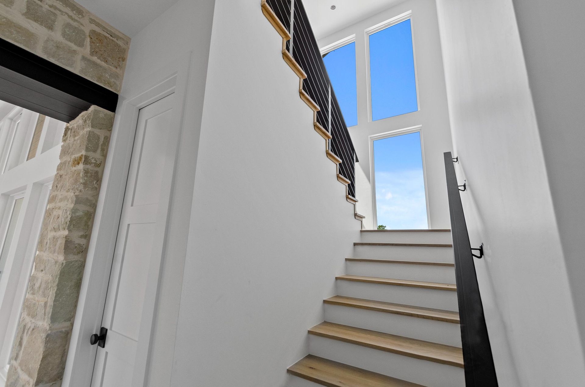 A staircase leads up to the second floor of a house.