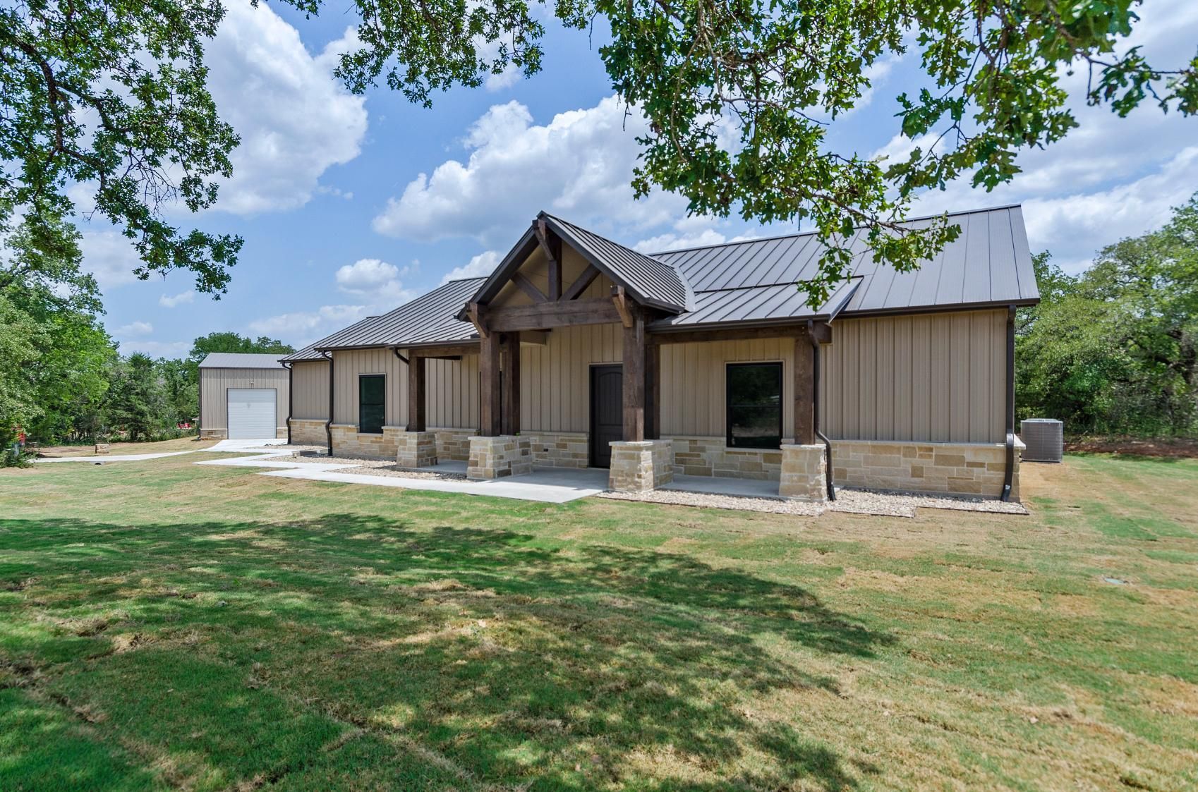 Spacious house with large windows.