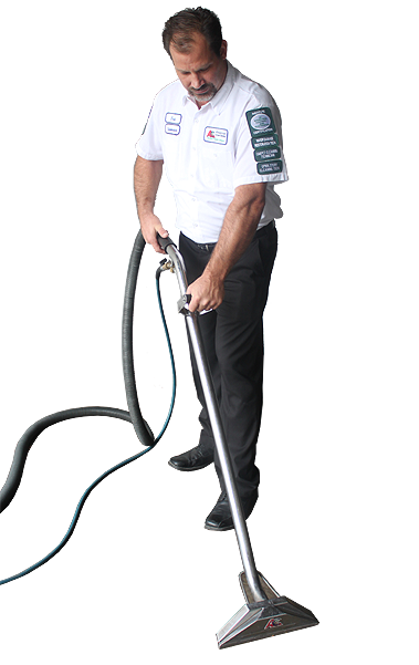 A man is using a vacuum cleaner on a white background.