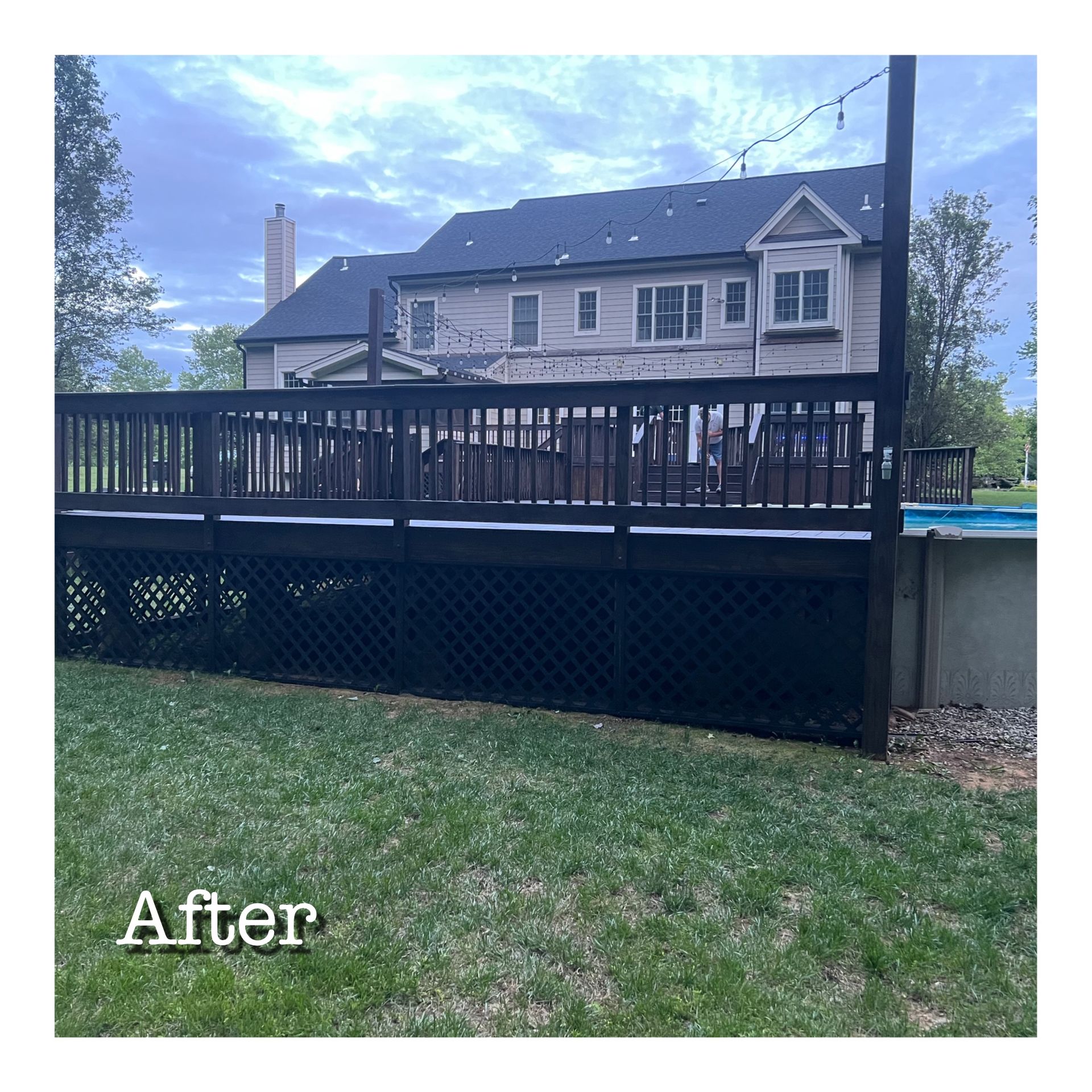 A large house with a large deck and a pool in the backyard.