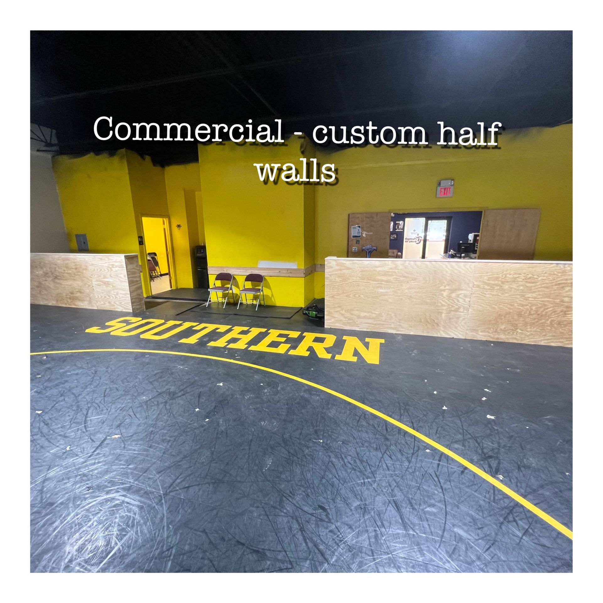 A picture of a gym with the words commercial custom half walls written on the floor
