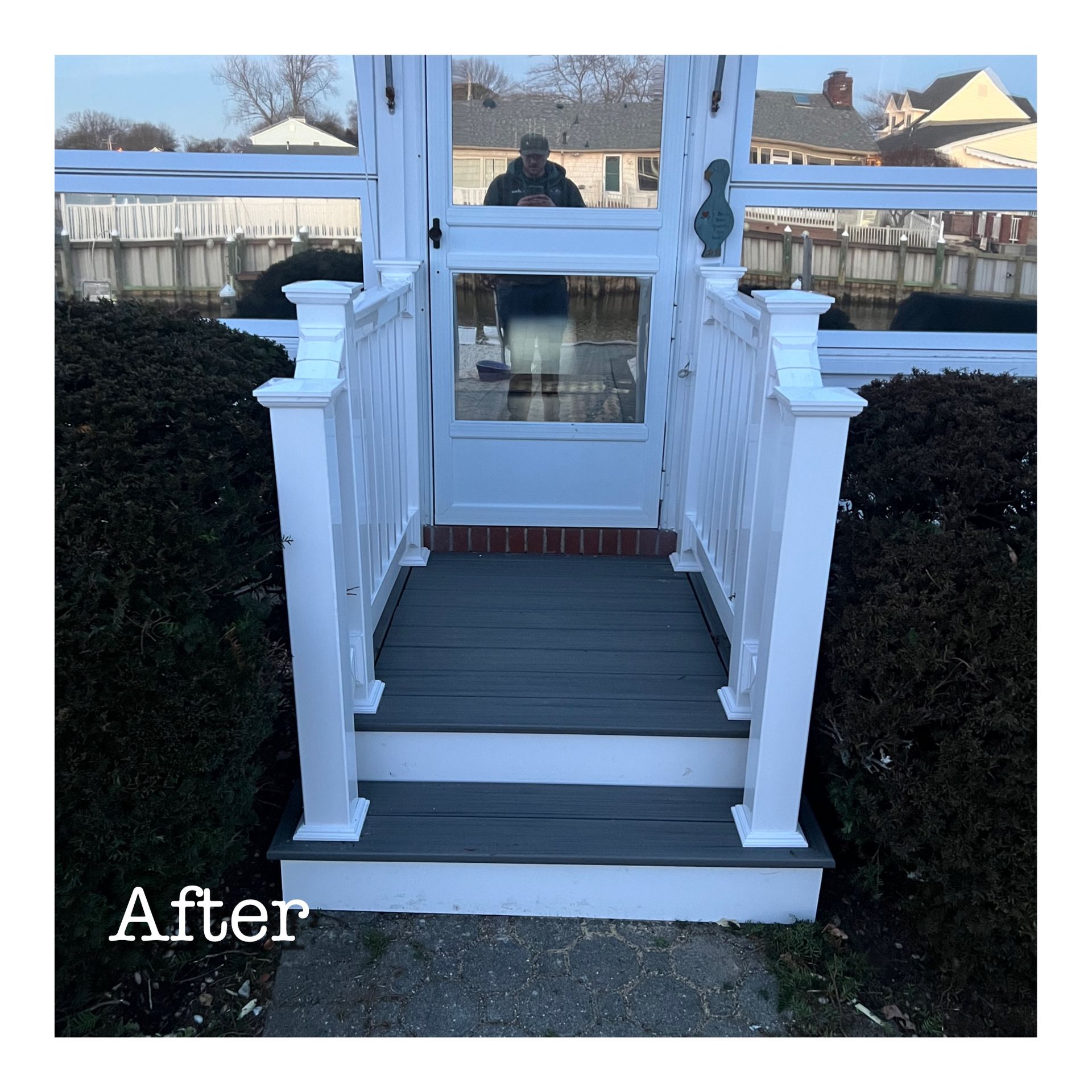 A picture of a porch and stairs after being painted