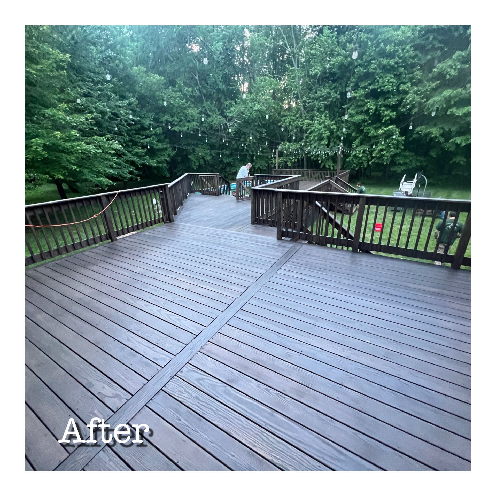 A picture of a deck after being painted.