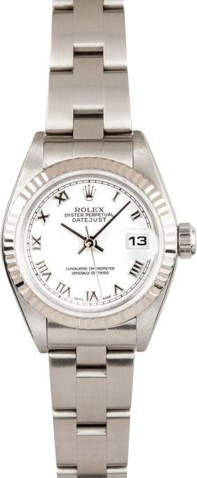 Silver wristwatch with a white face and date display on a metal link bracelet