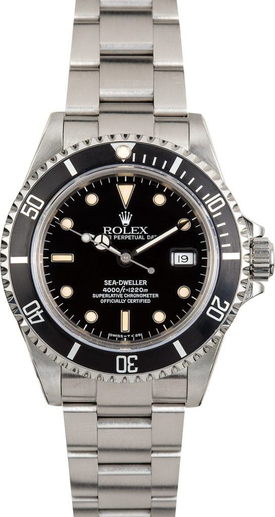 Rolex Submariner wristwatch with black dial and silver metal bracelet