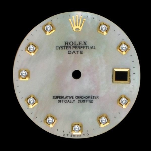 Rolex Oyster Perpetual Date watch dial with diamond markers and gold crown logo