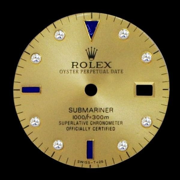 Gold Rolex Submariner watch dial with diamond markers and blue accents